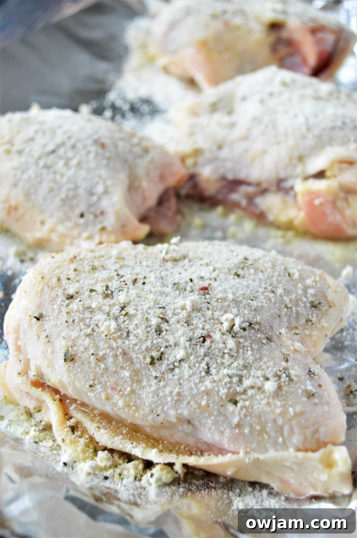 Zesty Ranch Chicken Thighs 6 Oven Baked Ranch Chicken Thighs chicken with seasoning.