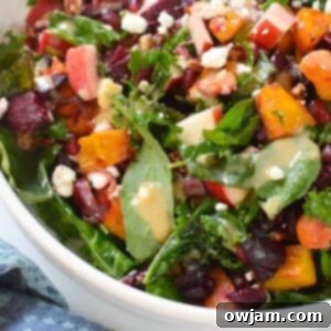 Autumn Bounty Bowl 10 A top-down view of the Fall Harvest Salad, showcasing all its colorful ingredients in a large white bowl.