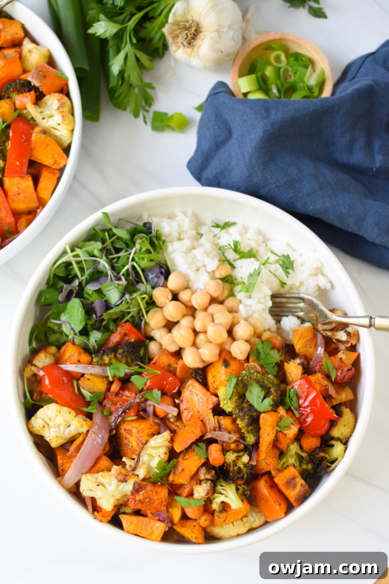 A close-up shot of a Sweet Potato Bowl with a fork, ready to be enjoyed.