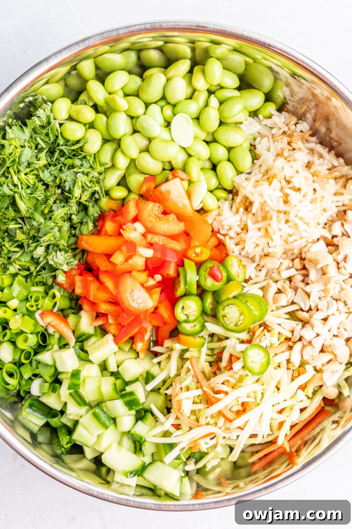 Tropical Coconut Rice Salad 8 Close-up of Coconut Rice Salad ingredients in a bowl, showing the vibrant colors.