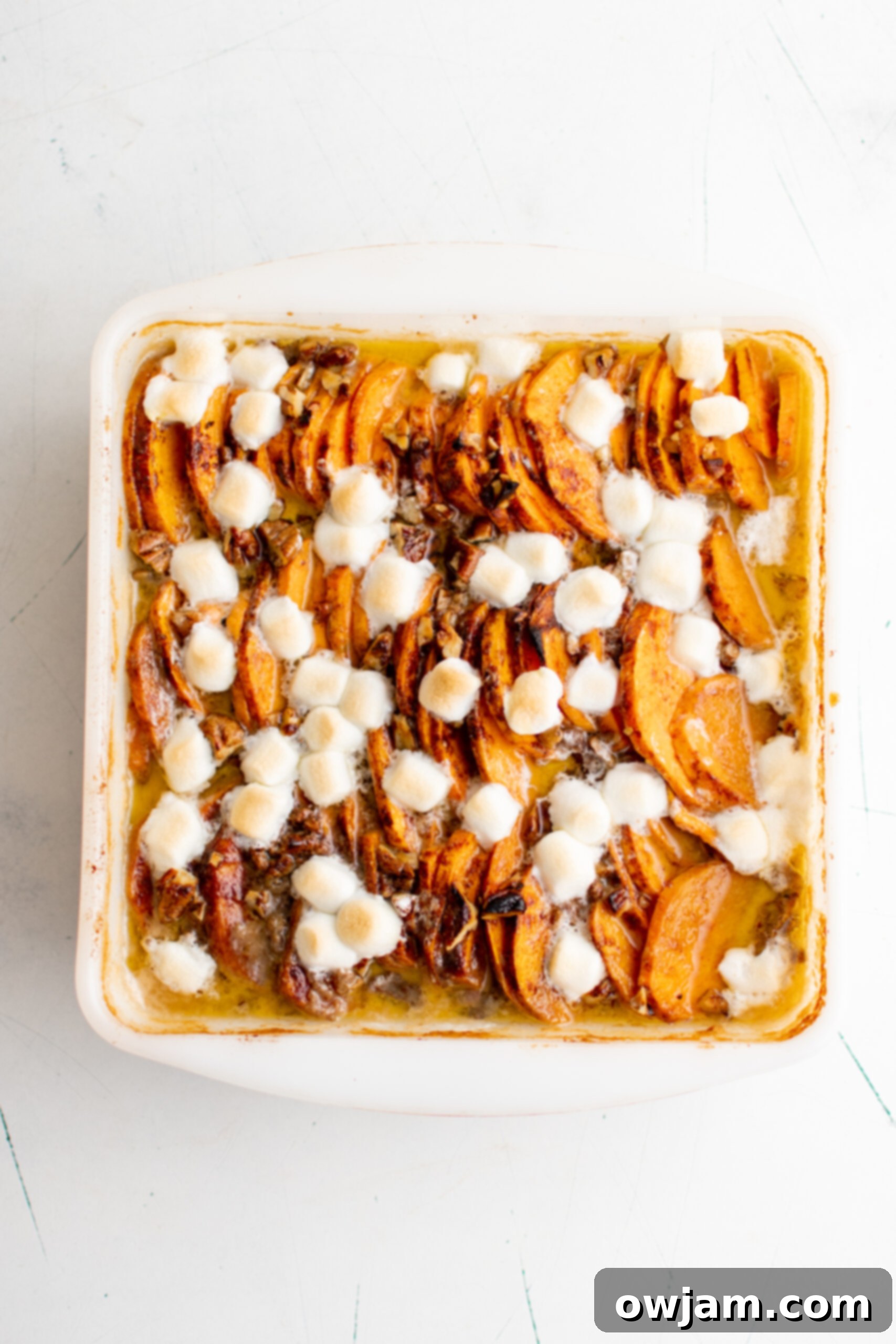Effortless Sweet Potato Bake 8 Easy Scalloped Sweet Potatoes with marshmallows.