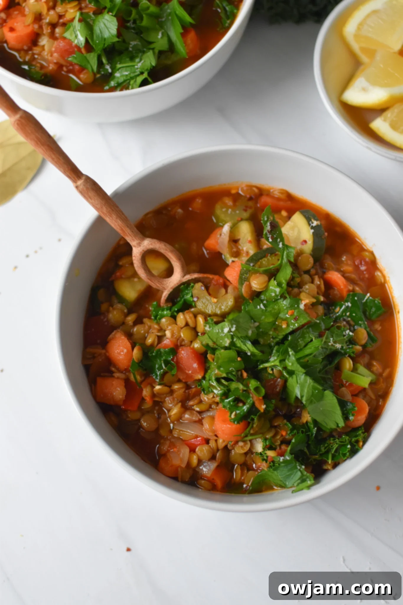 Tuscan Lentil Soup 6 Italian Style Lentil Soup with wooden spoon.