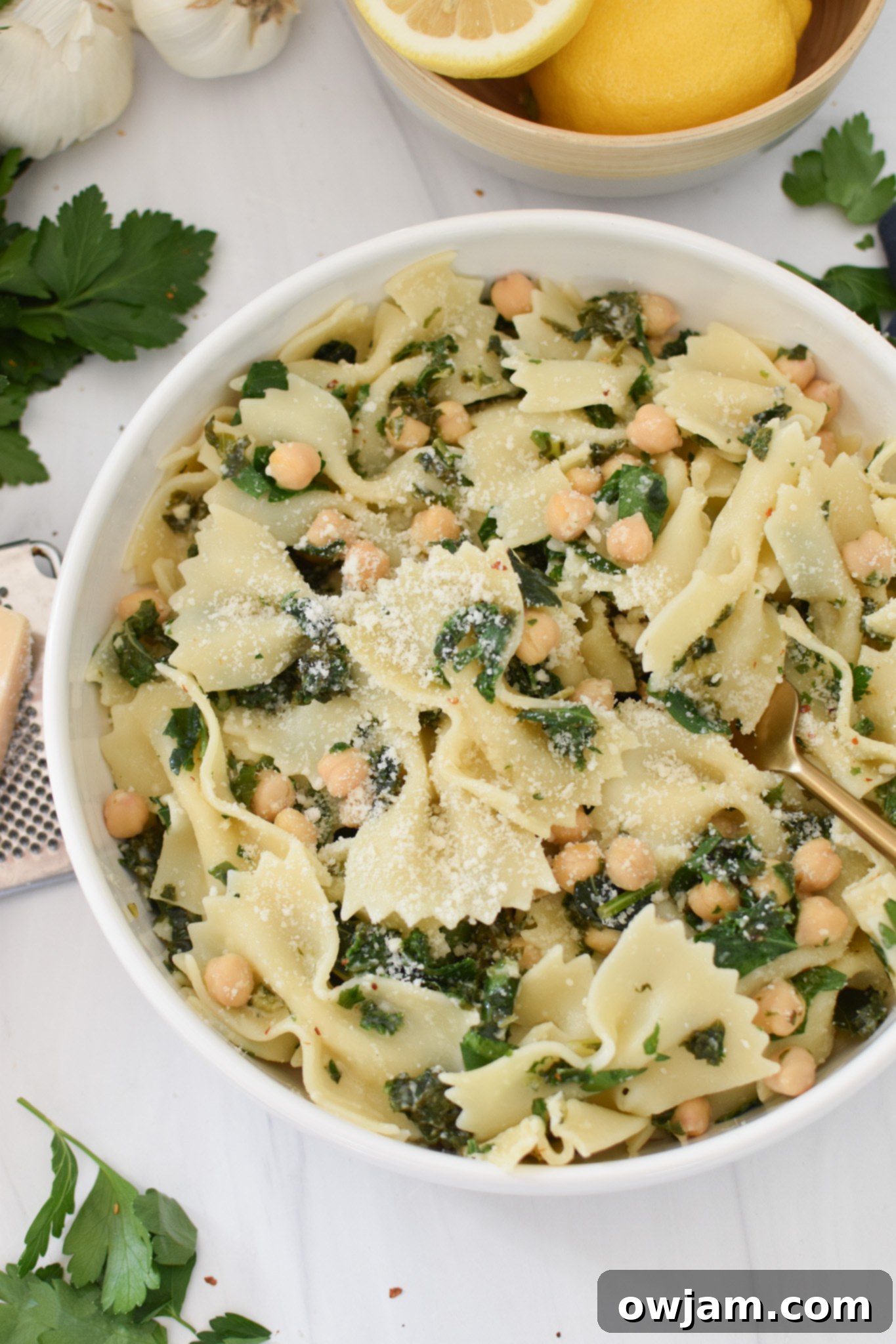 Cheesy Kale Pasta in a white bowl. 