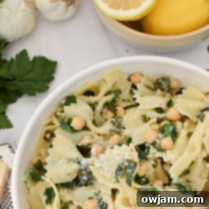 Cheesy Kale Pasta in a white bowl.
