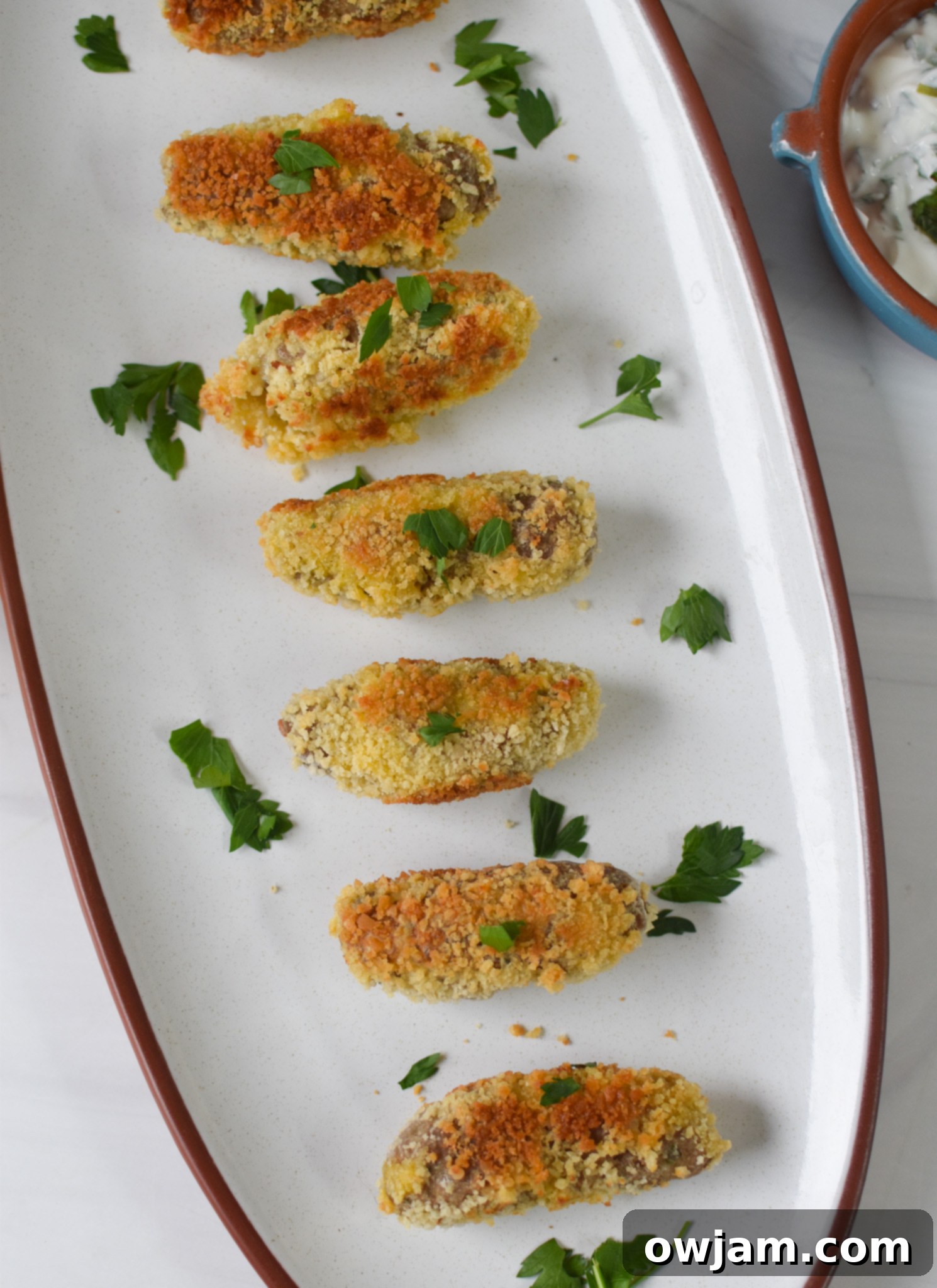 Crispy Lamb Bites 5 Lamb Croquettes with parsley.