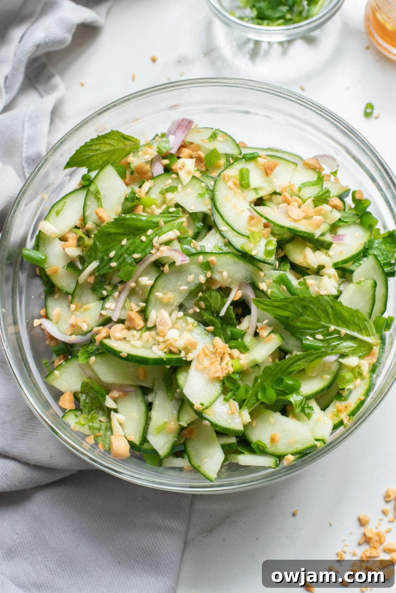 Zesty Thai Cucumber Delight 2 Thai Cucumber Salad in glass bowl.