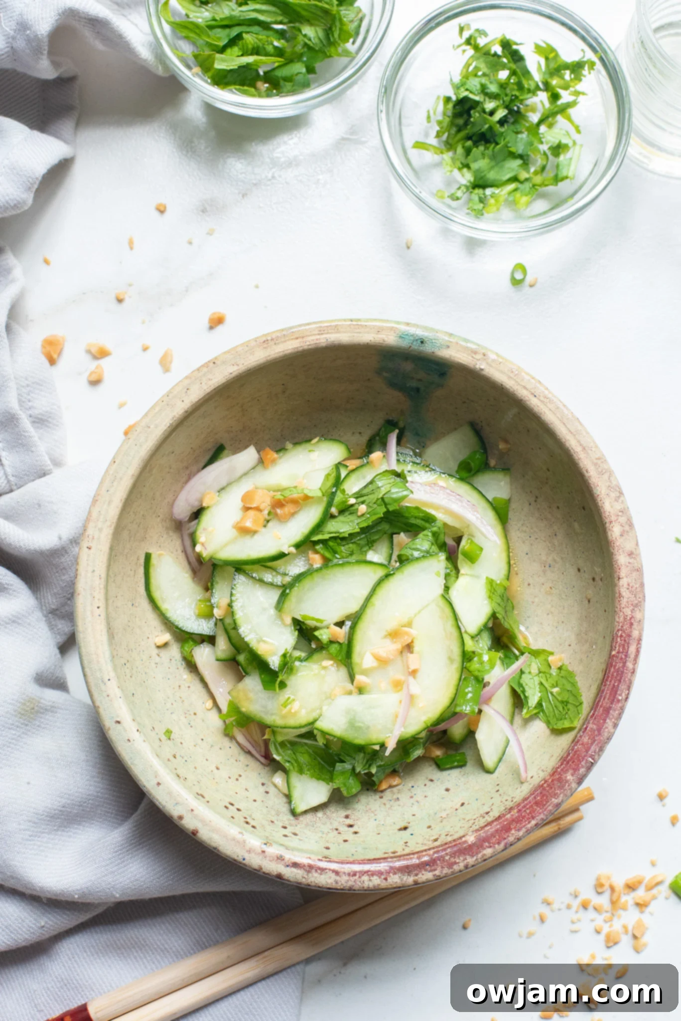 Zesty Thai Cucumber Delight 4 Thai Cucumber Salad in a pottery bowl.