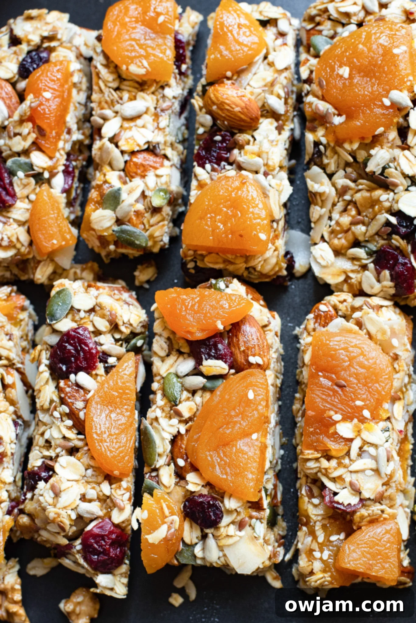 Effortless Date Granola Bars 2 Easy Date Granola Bars on a black board. Delicious and healthy no-bake snack bars.