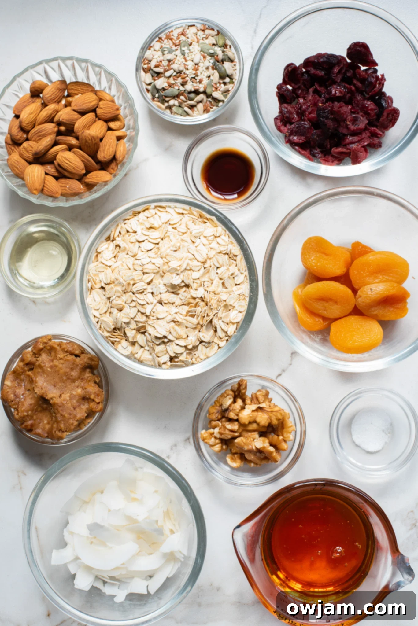 Effortless Date Granola Bars 3 Close-up of Easy Date Granola Bars ingredients spread out on a wooden surface.