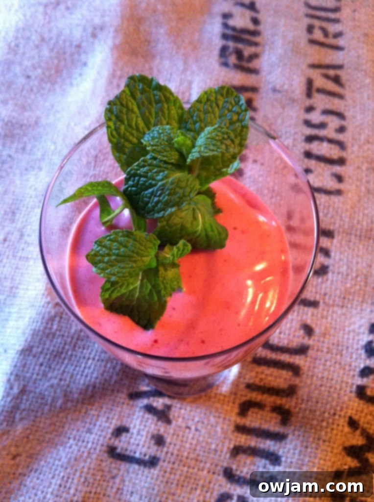 Delicious Berry Smoothie in a glass with berries