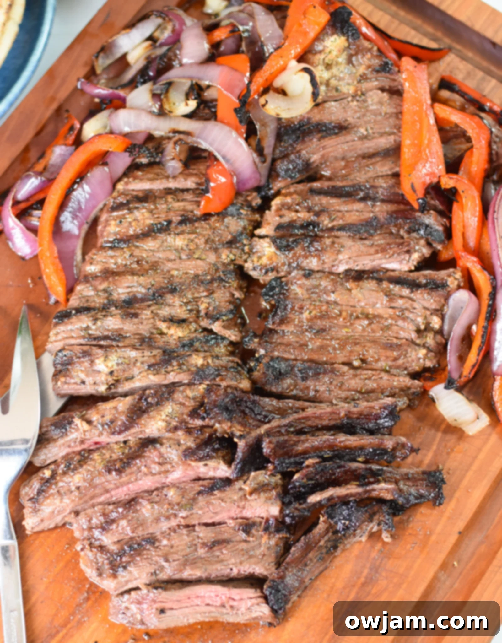 Easy Beef Gyros beef on a cutting board.