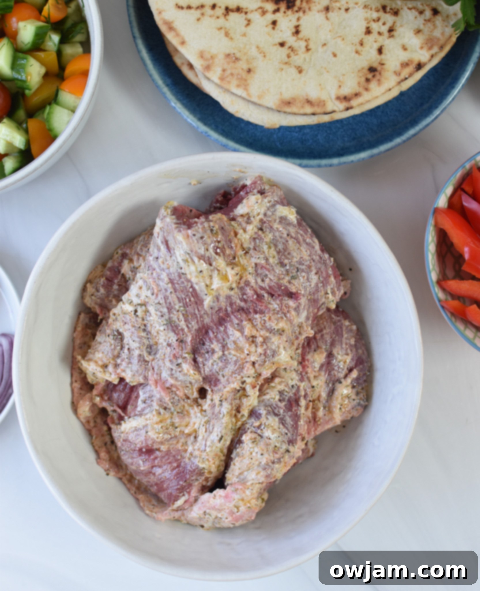 Easy Beef Gyros beef in yogurt marinade.