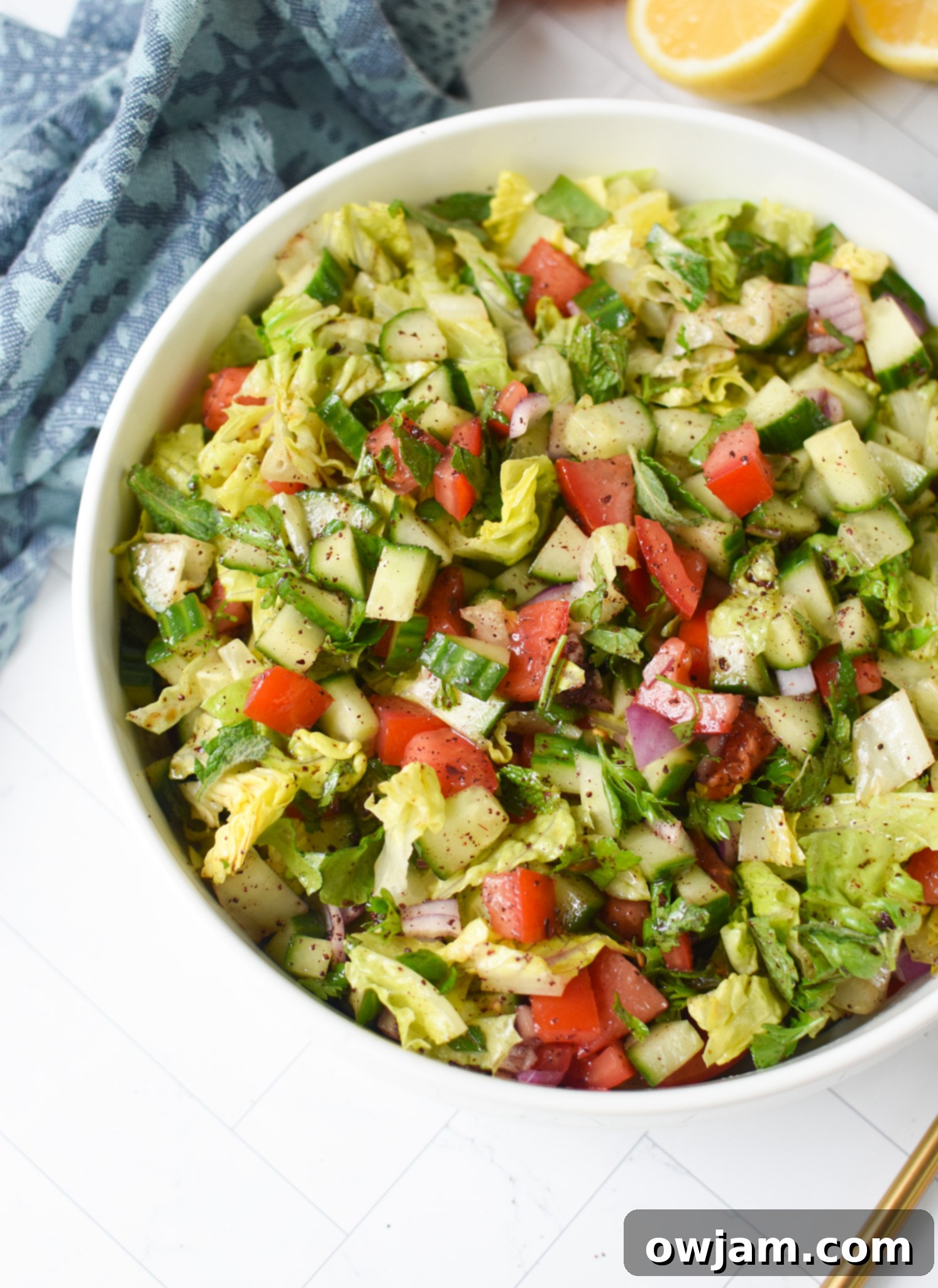 Simple Arabic Salad 5 Easy Arabic Salad served in a large white bowl, highlighting its generous portion and appealing presentation.