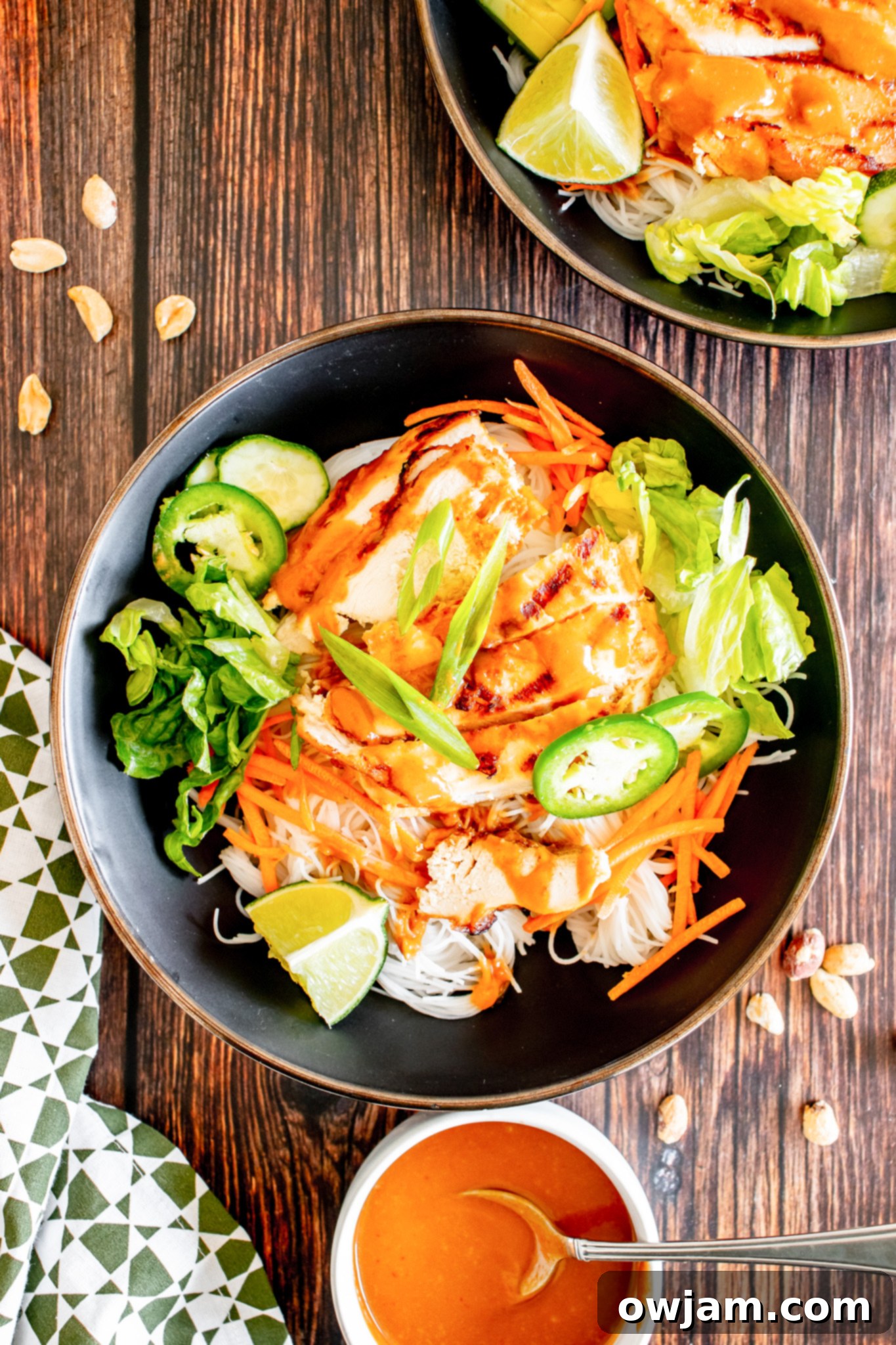 Vibrant Thai Chicken Noodle Salad with fresh carrots, ready to serve.