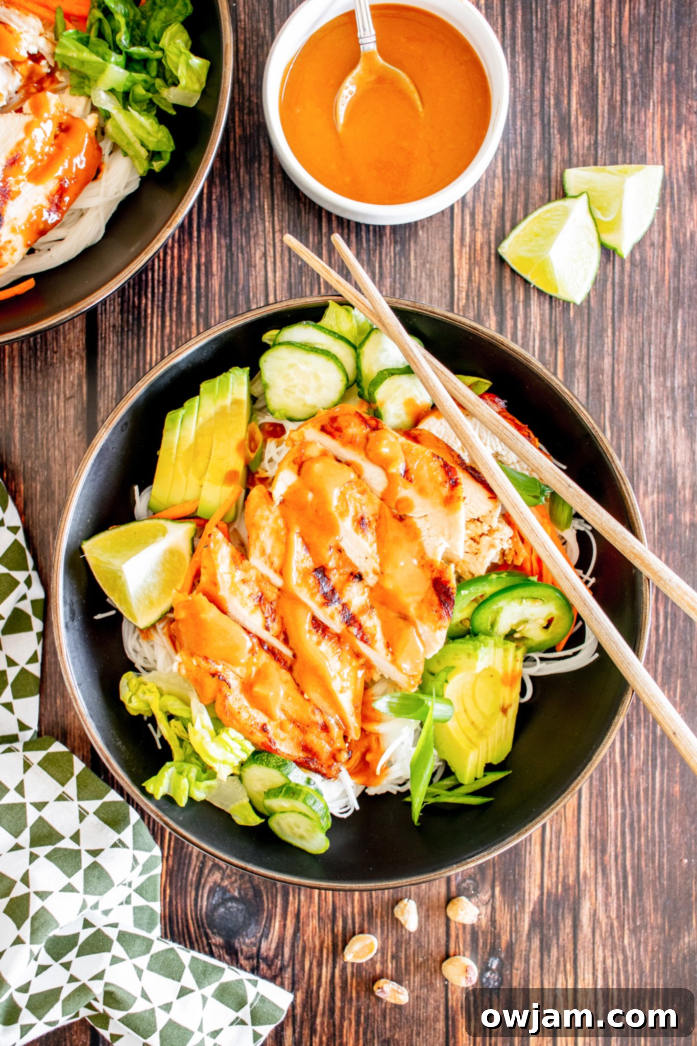 Thai Chicken Noodle Salad with chopsticks in a bowl.