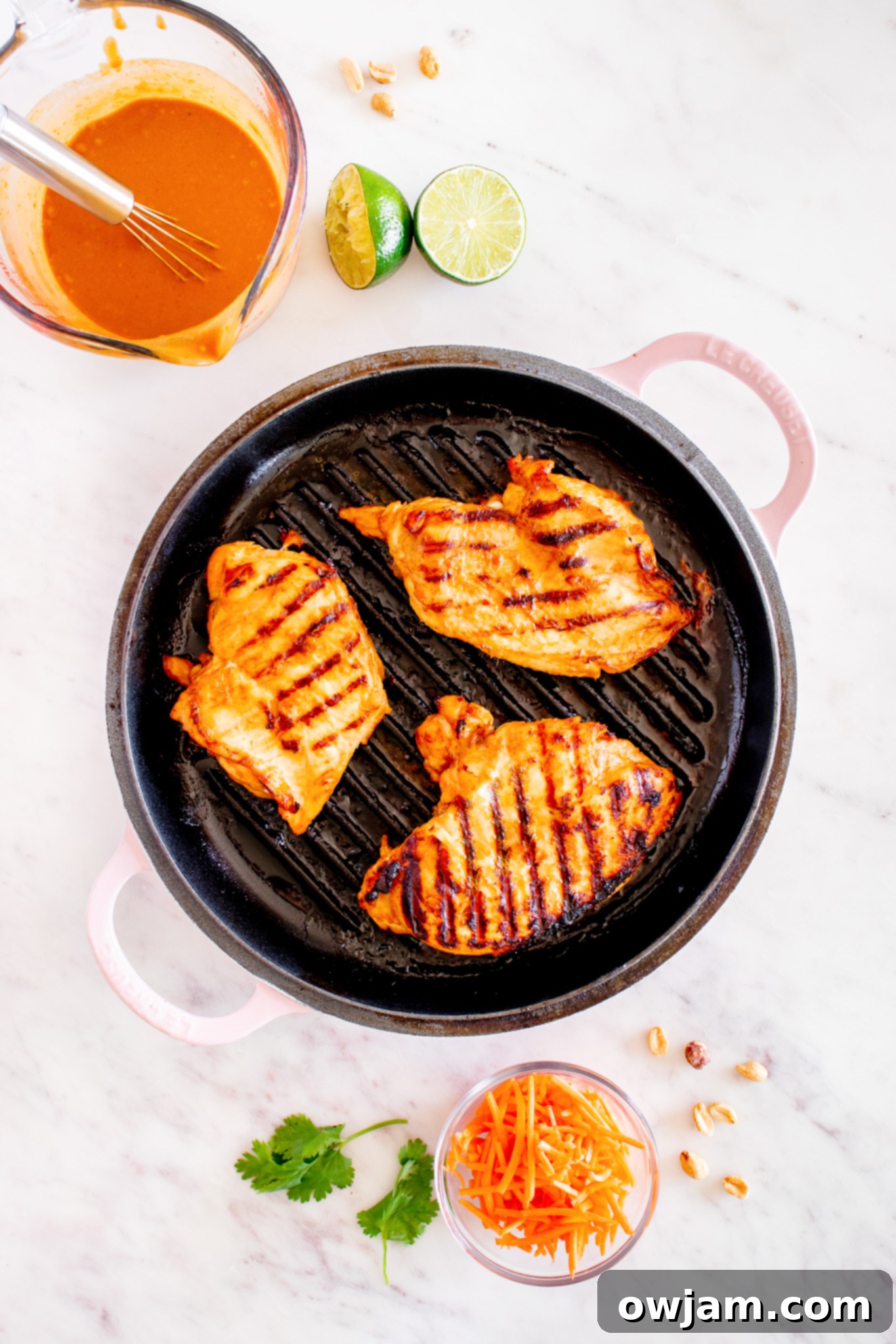 Perfectly grilled chicken, sliced and ready for the Thai Chicken Noodle Salad.