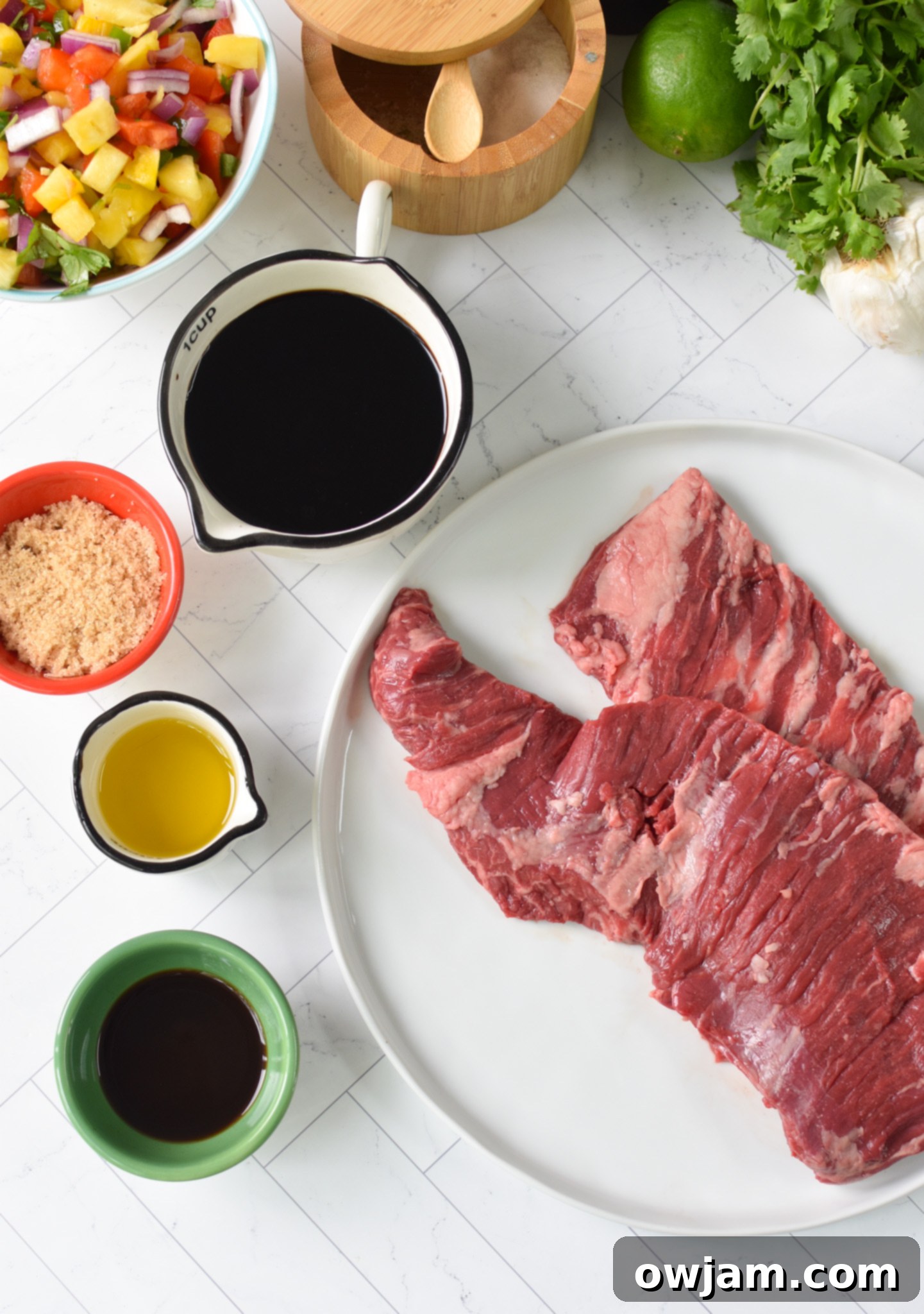 Balsamic Marinated Skirt Steak ingredients on a white board. 