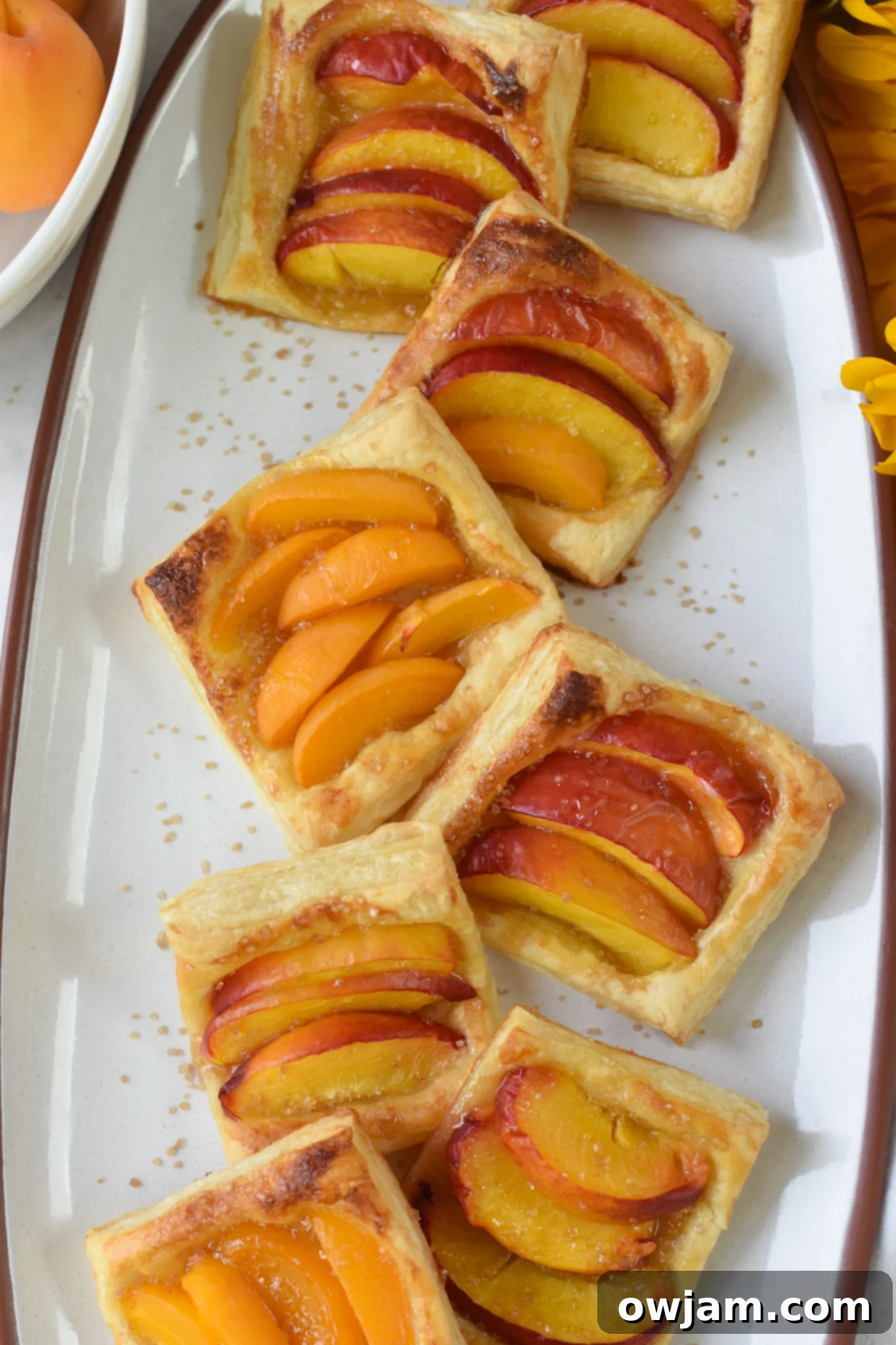 Easy Peach Tart tart with sugar on it.
