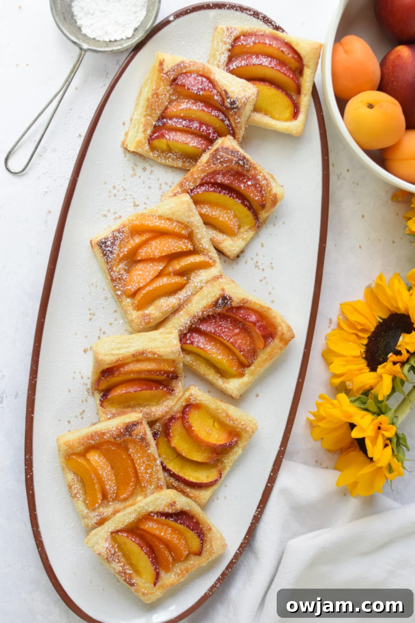 Easy Peach Tart on a white platter. 