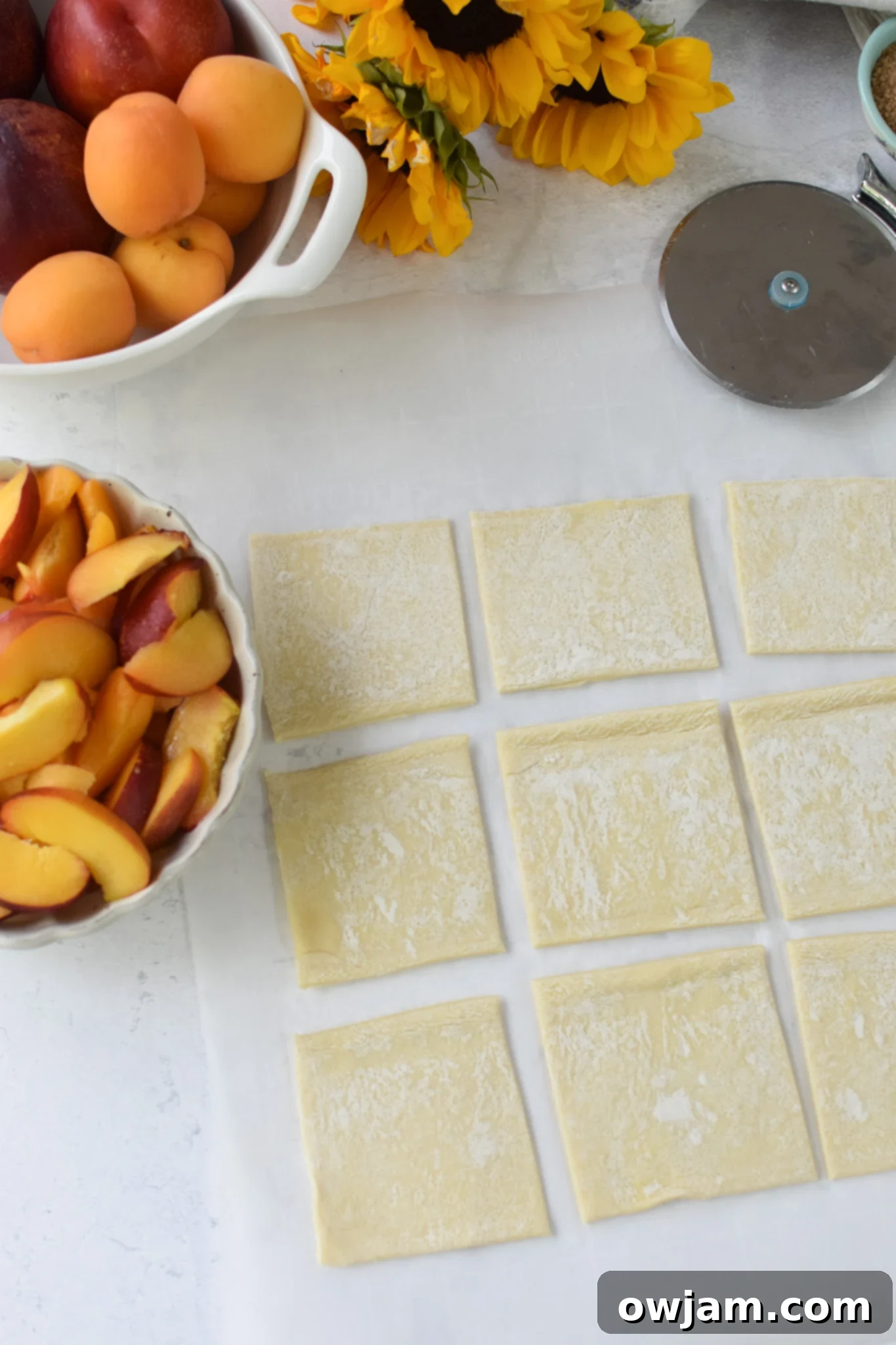 Easy Peach Tart cut puff pastry.