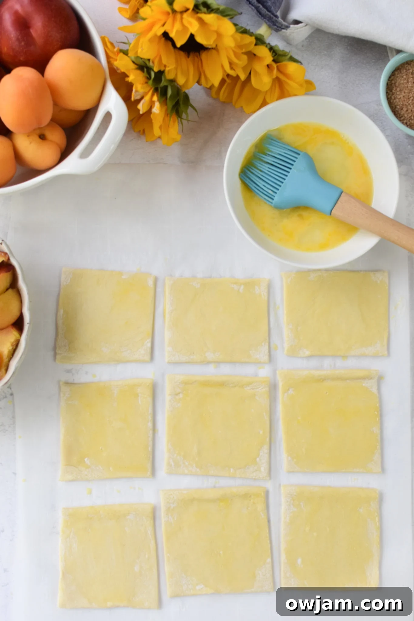 Easy Peach Tart egg wash on pastry. 