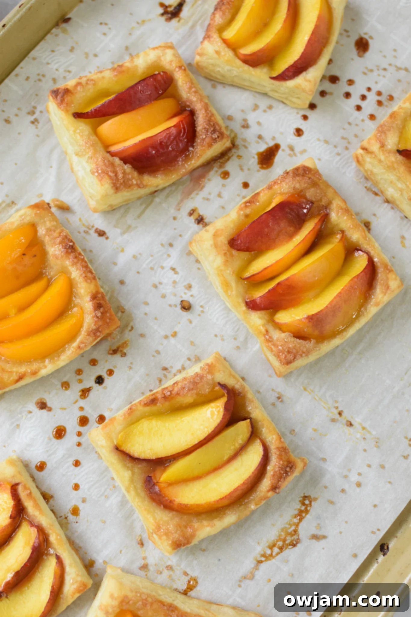 Easy Peach Tart tart on a baking sheet. 