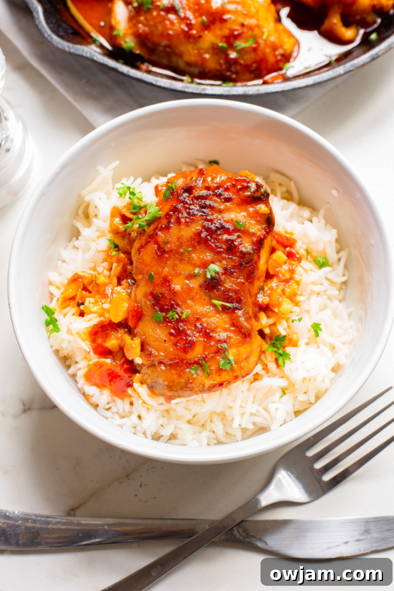 Spicy Harissa Chicken 2 Harissa Chicken Recipe in a white bowl.