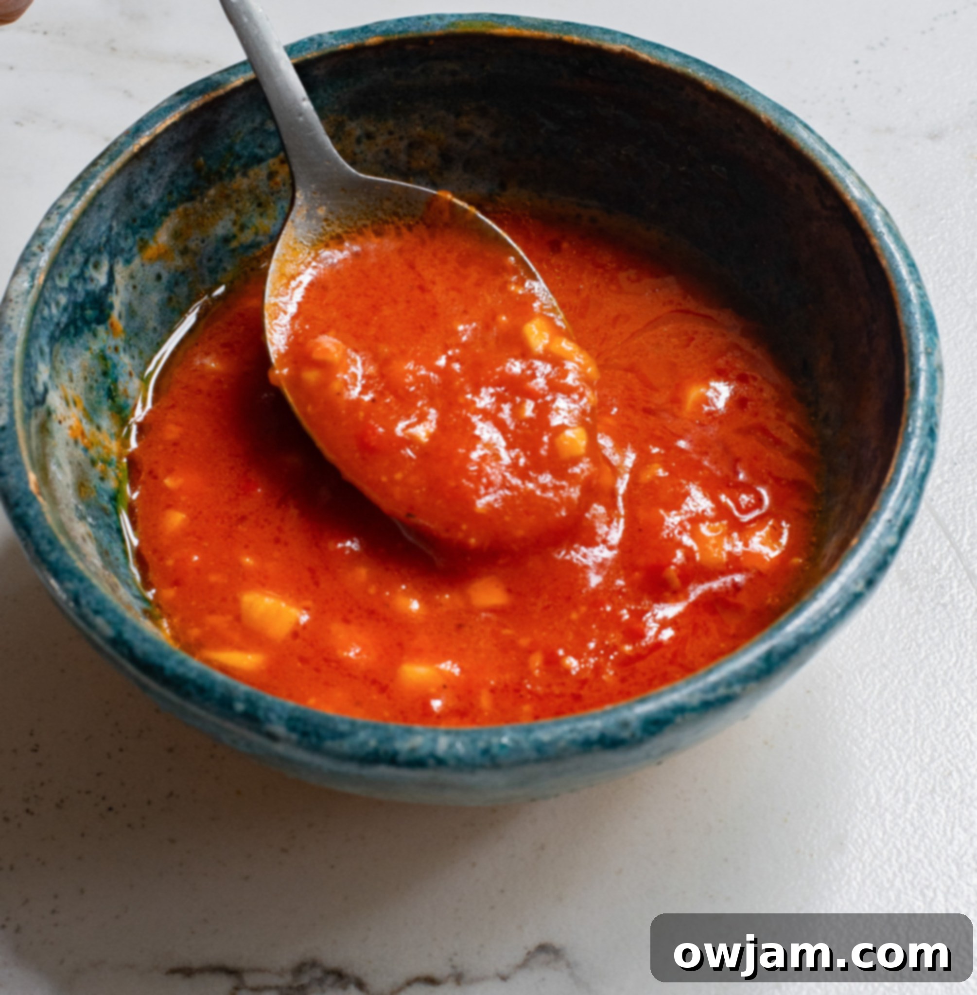 Spicy Harissa Chicken 6 Harissa Chicken Recipe harissa paste in a bowl.