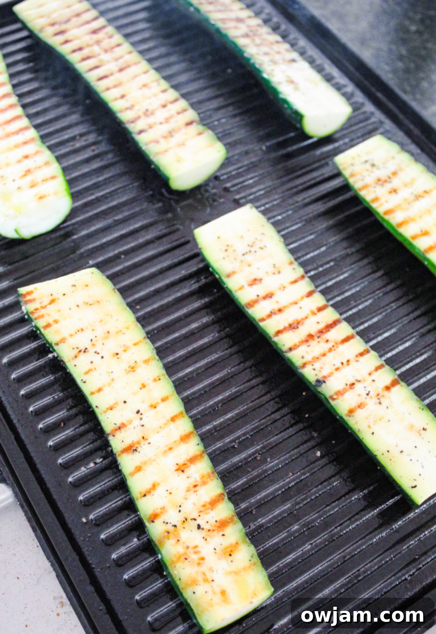 Zesty Zucchini Tacos 5 Zucchini and corn grilling on a hot barbecue.