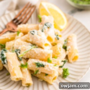 Zesty Lemon Ricotta Pasta 12 Lemon Ricotta Pasta with fork.