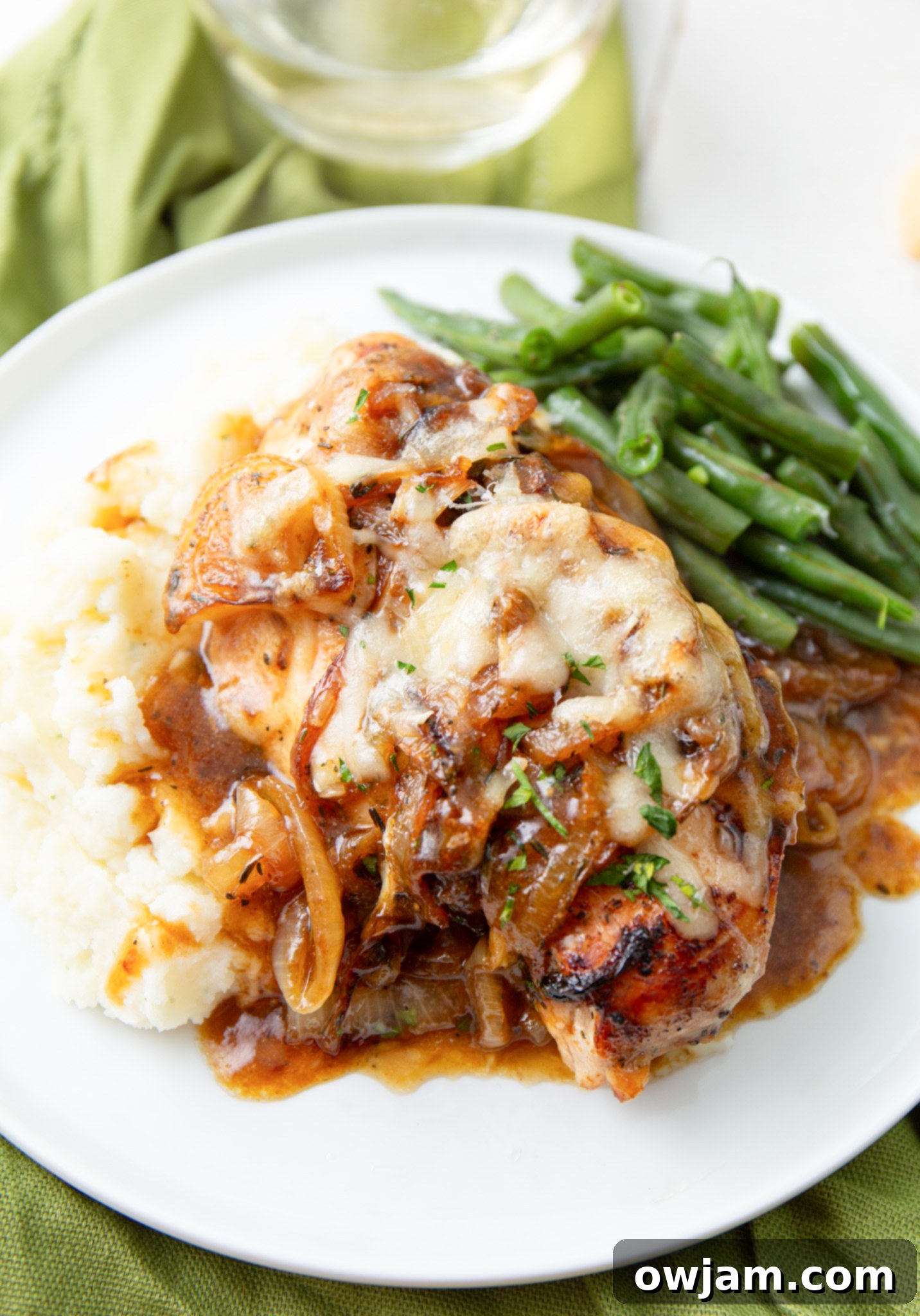 Irresistible French Onion Chicken 3 Plated French Onion Chicken with green beans.