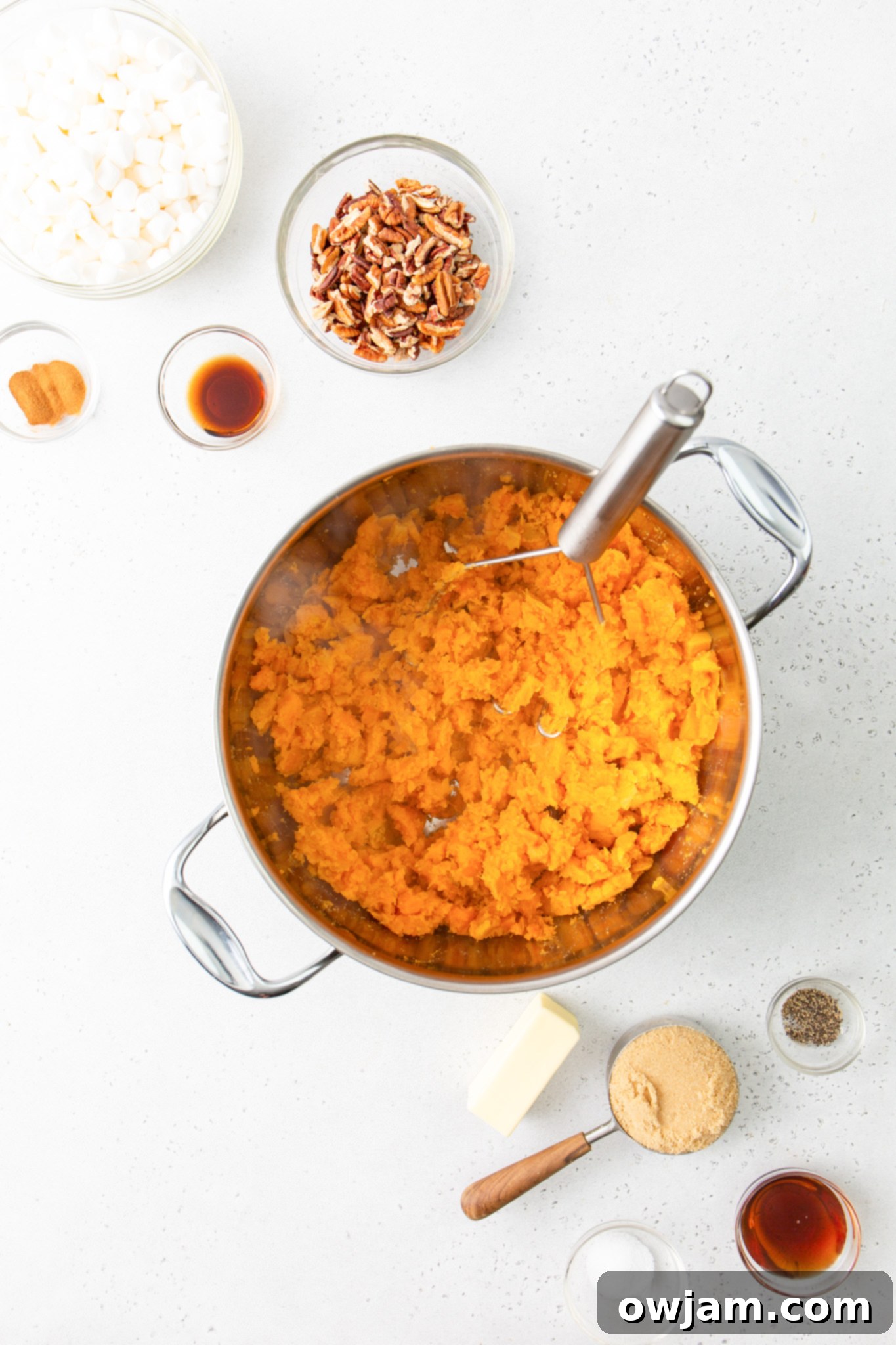 Golden Sweet Potato Marshmallow Bake 6 Sweet Potato Casserole with Marshmallows potatoes mashed in pot