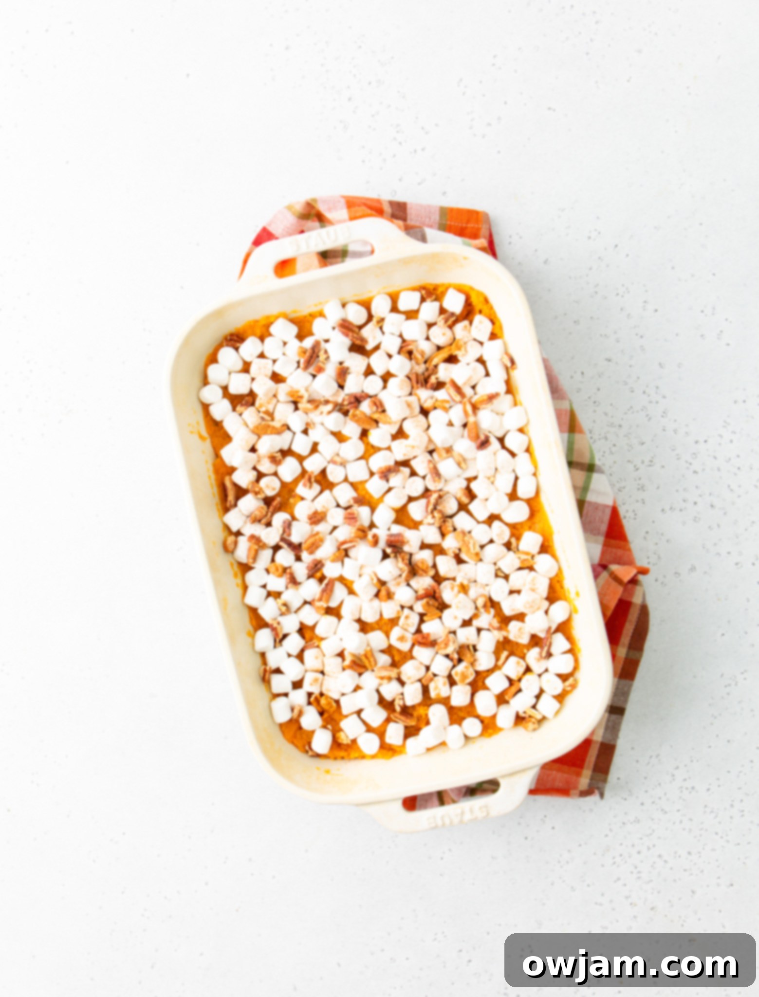 Golden Sweet Potato Marshmallow Bake 9 Sweet Potato Casserole with Marshmallows in a casserole dish