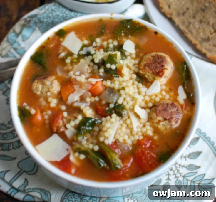 Classic Italian Wedding Soup 3 Close-up of a bowl of healthy Italian Wedding Soup with small pasta and turkey meatballs