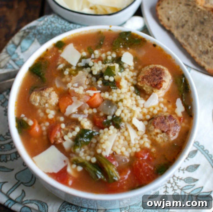 Classic Italian Wedding Soup 6 A large pot of healthy Italian Wedding Soup simmering on the stove