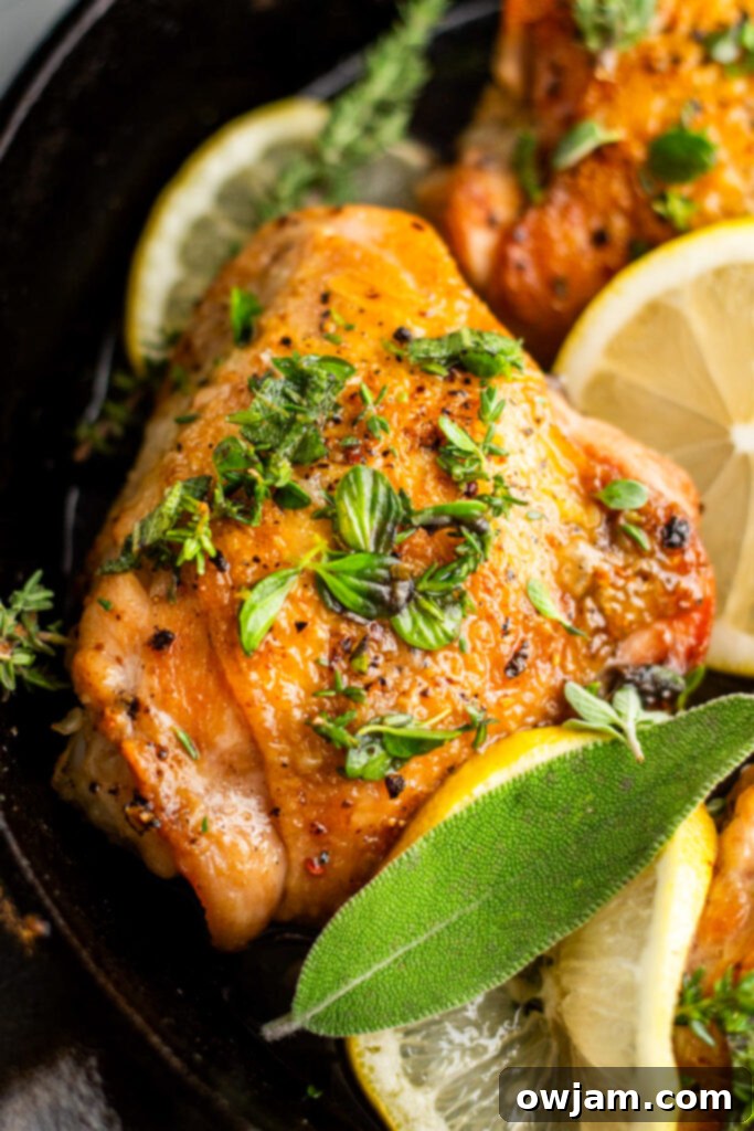 Zesty Lemon Garlic Chicken 9 Lemon Garlic Chicken with lemons and sage.