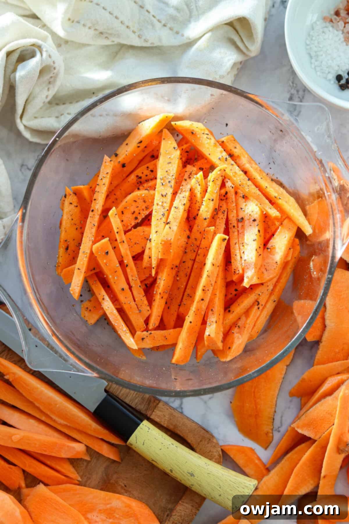 Air Fryer Sweet Potato Fries in a bowl with spices