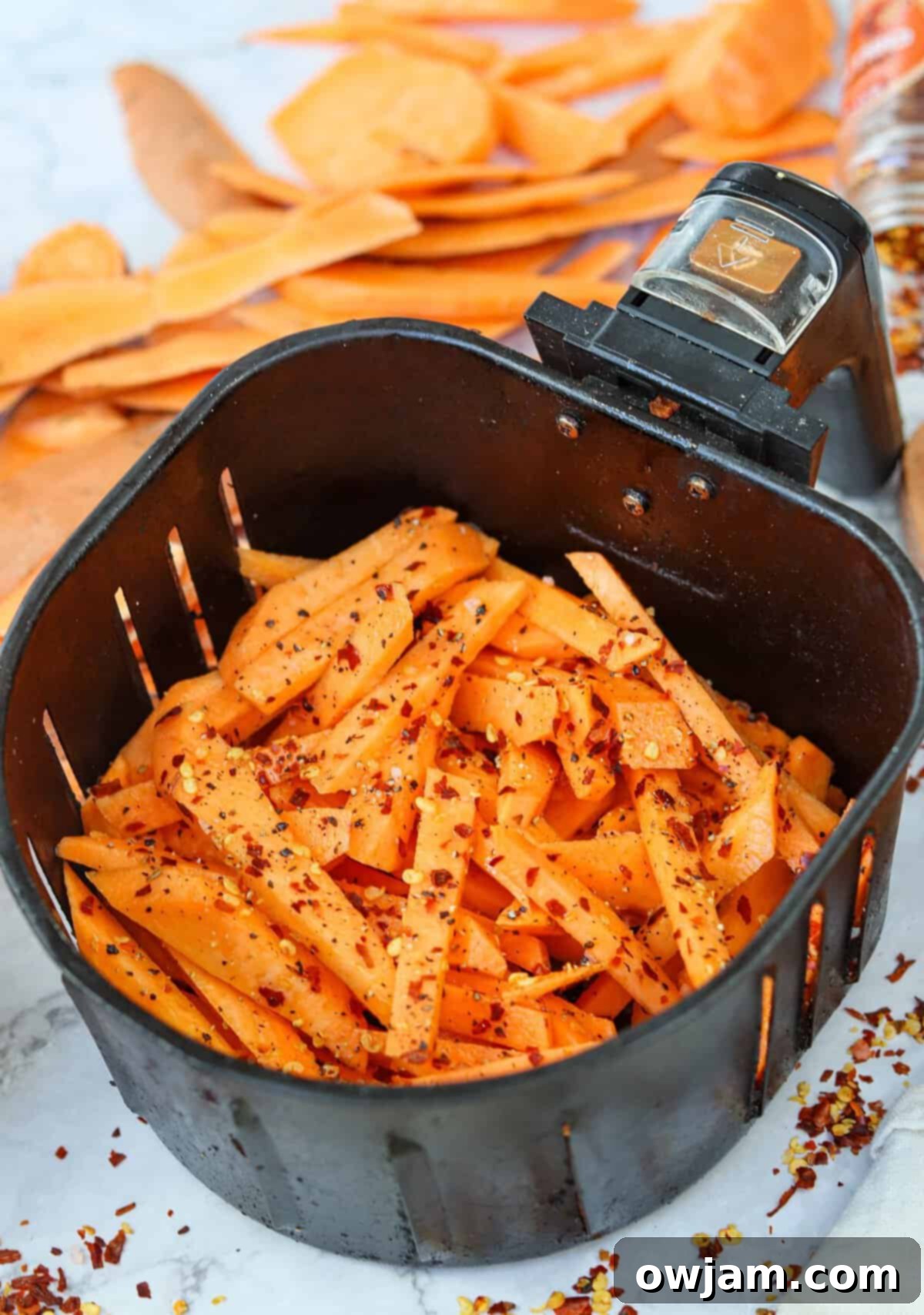 Air Fryer Sweet Potato Fries in an air fryer basket
