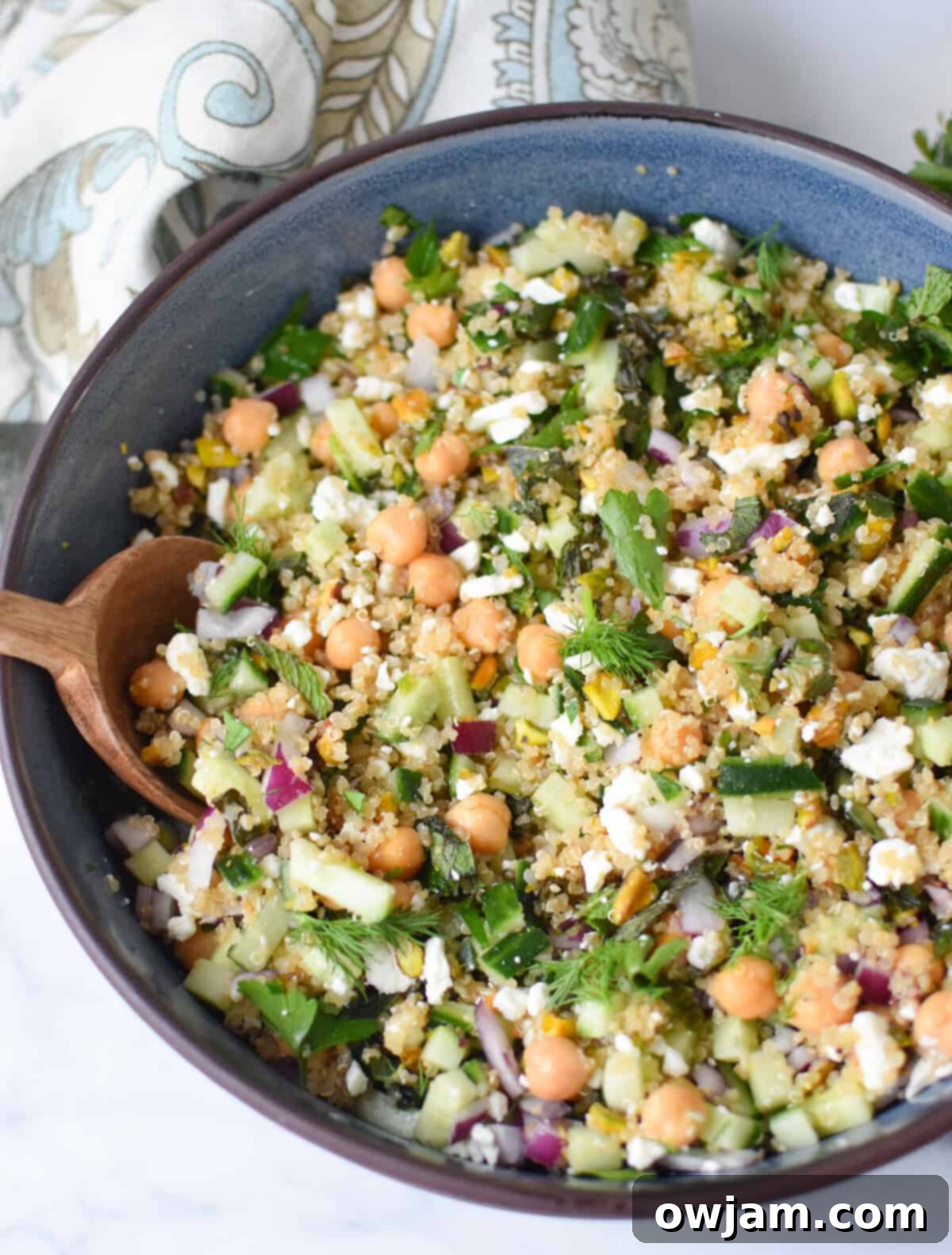 salad ingredients combined in a salad bowl. 