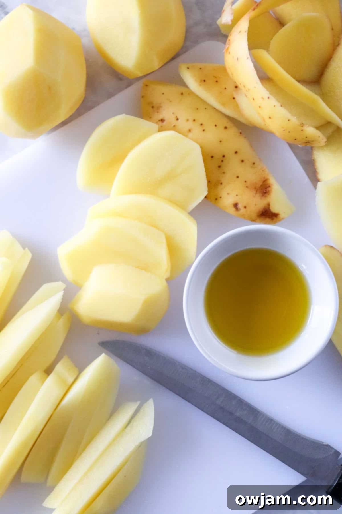 Ultimate Crispy Air Fryer French Fries 6 Air Fryer French Fries Recipe fries being cut