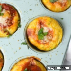 Cheesy Pizza Egg Bites 13 Pizza Egg Muffins in a teal baking pan