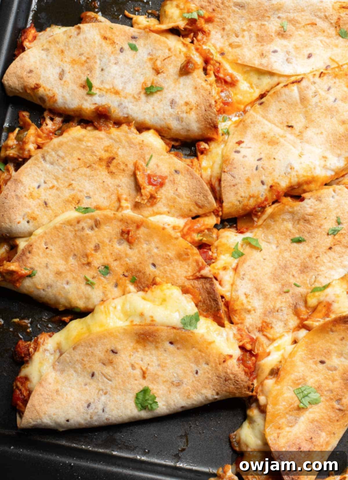 Baked Chicken Tacos on a baking sheet, golden and ready to eat