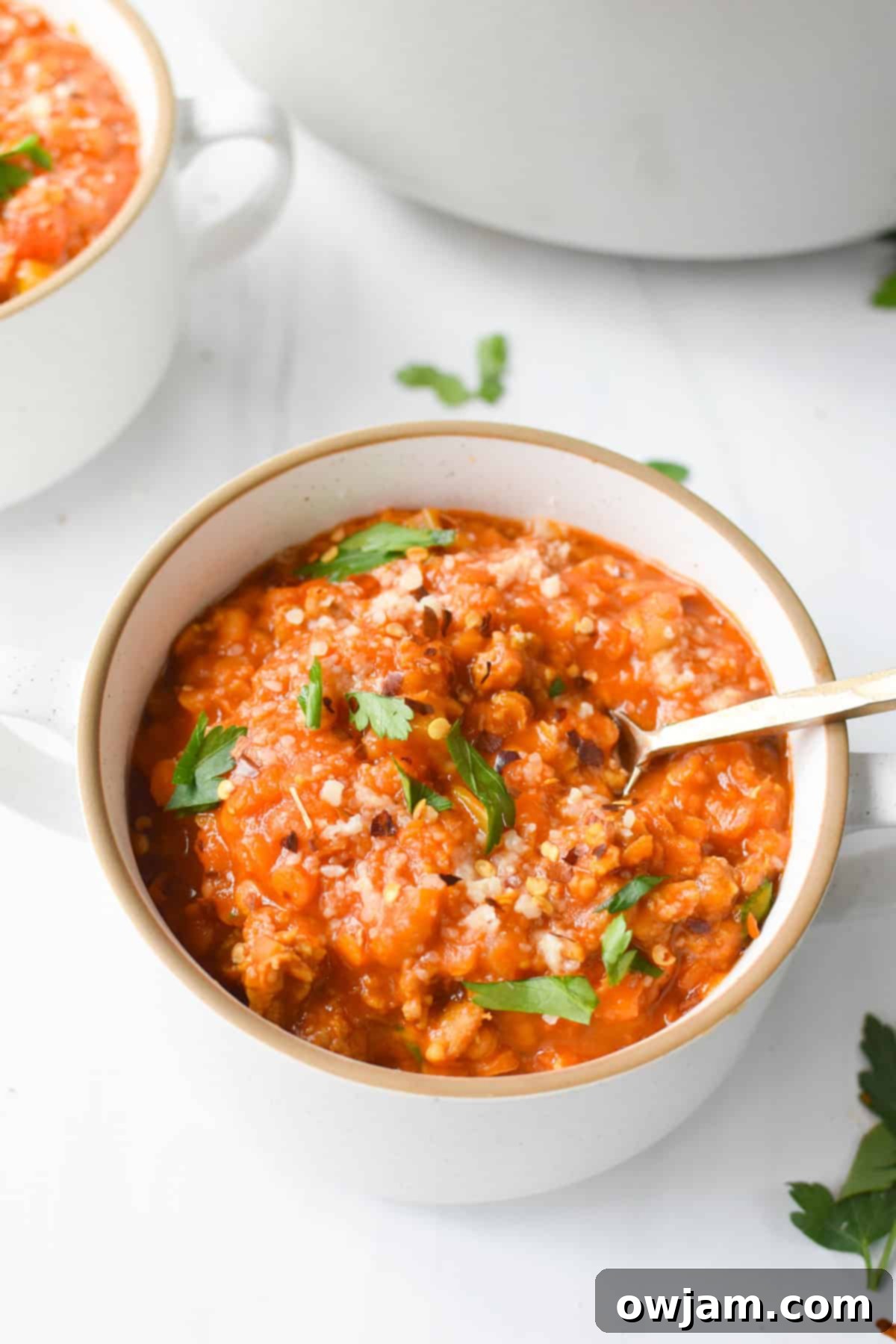 This Lentil Sausage Soup Recipe in white bowl
