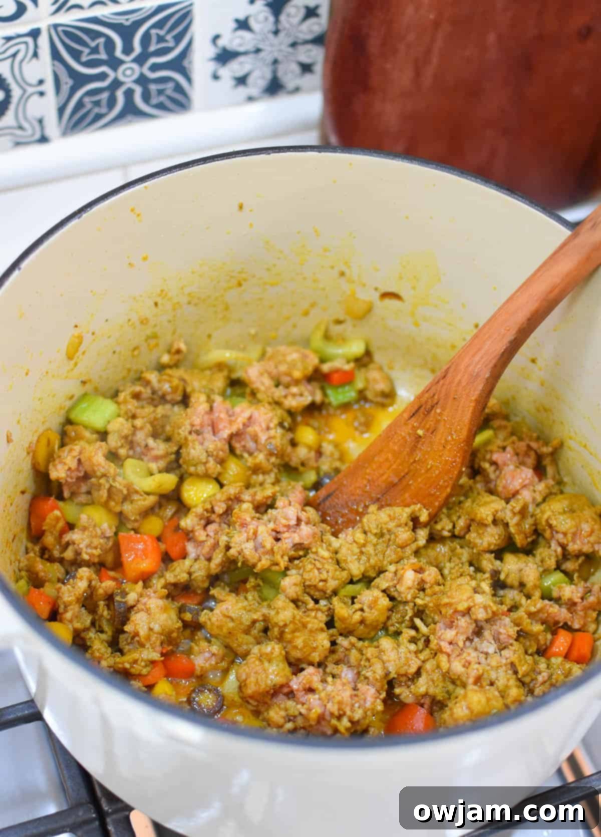Lentil Sausage Soup Recipe sausage and lentils in a pot.