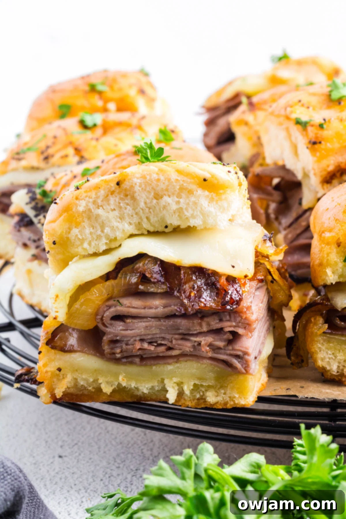 Ultimate Roast Beef Sliders 2 Roast Beef Sliders with cheese and onions