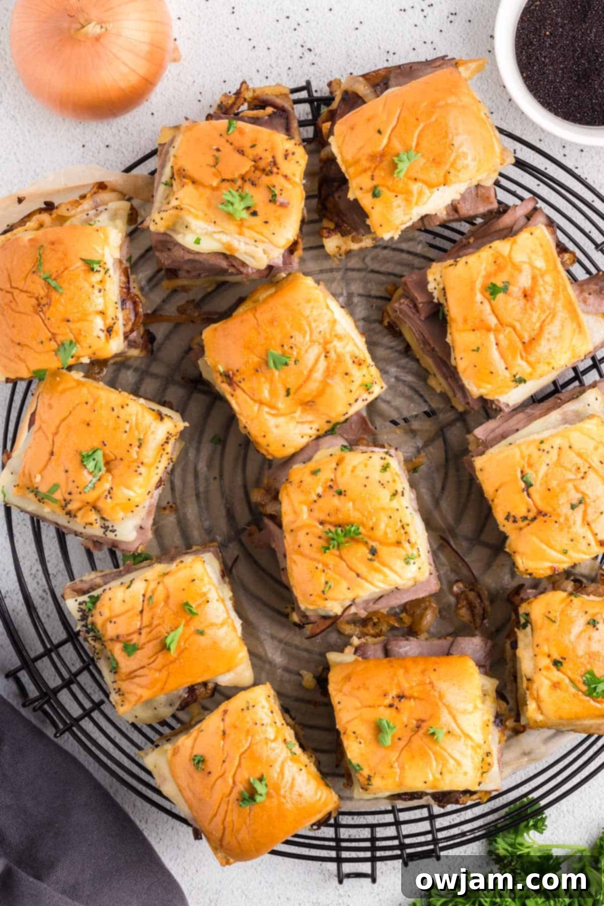 Ultimate Roast Beef Sliders 5 Roast Beef Sliders on a tray