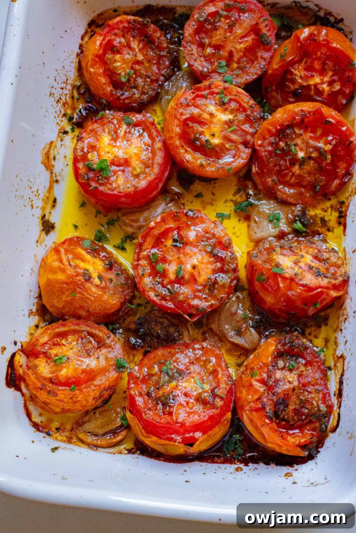Sweet Oven Roasted Tomatoes 3 Oven Roasted Tomatoes in white dish