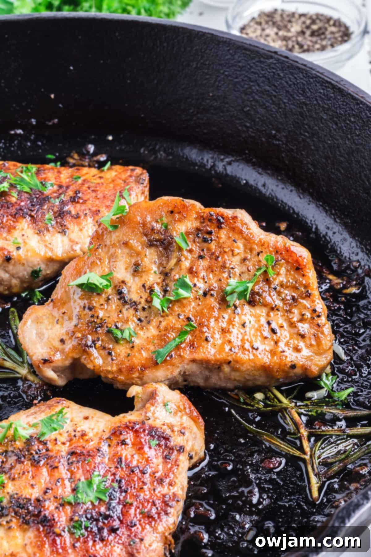 Pan Seared Pork Chops in a skillet