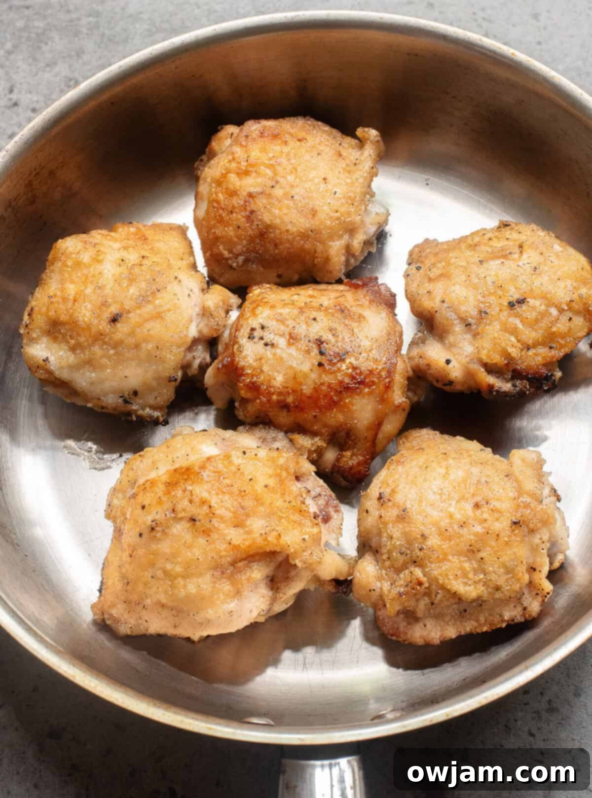 Sticky Honey Ginger Chicken 6 Honey Ginger Chicken in a skillet