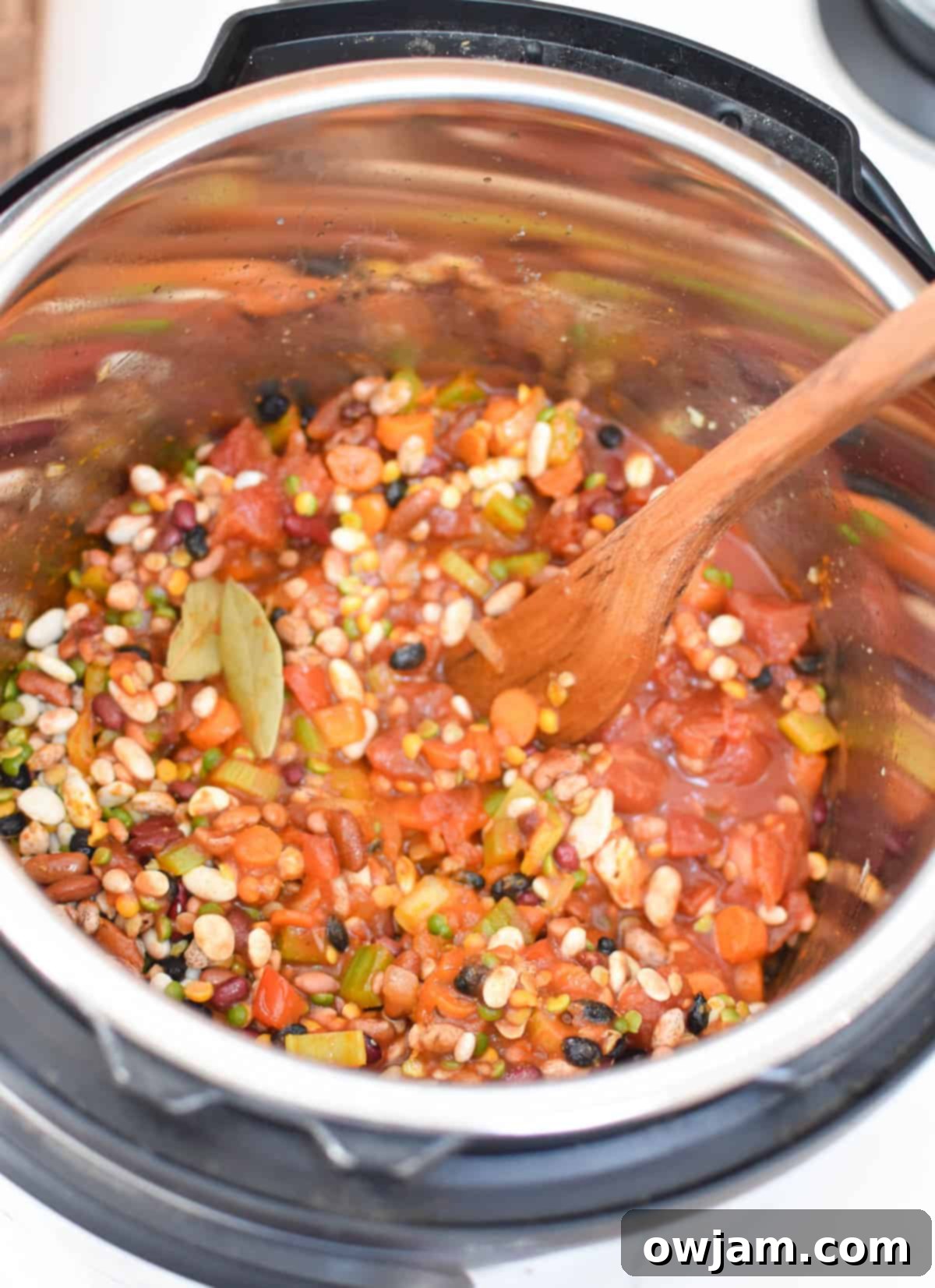 All Instant Pot 15 Bean Soup ingredients combined in the pot before pressure cooking.